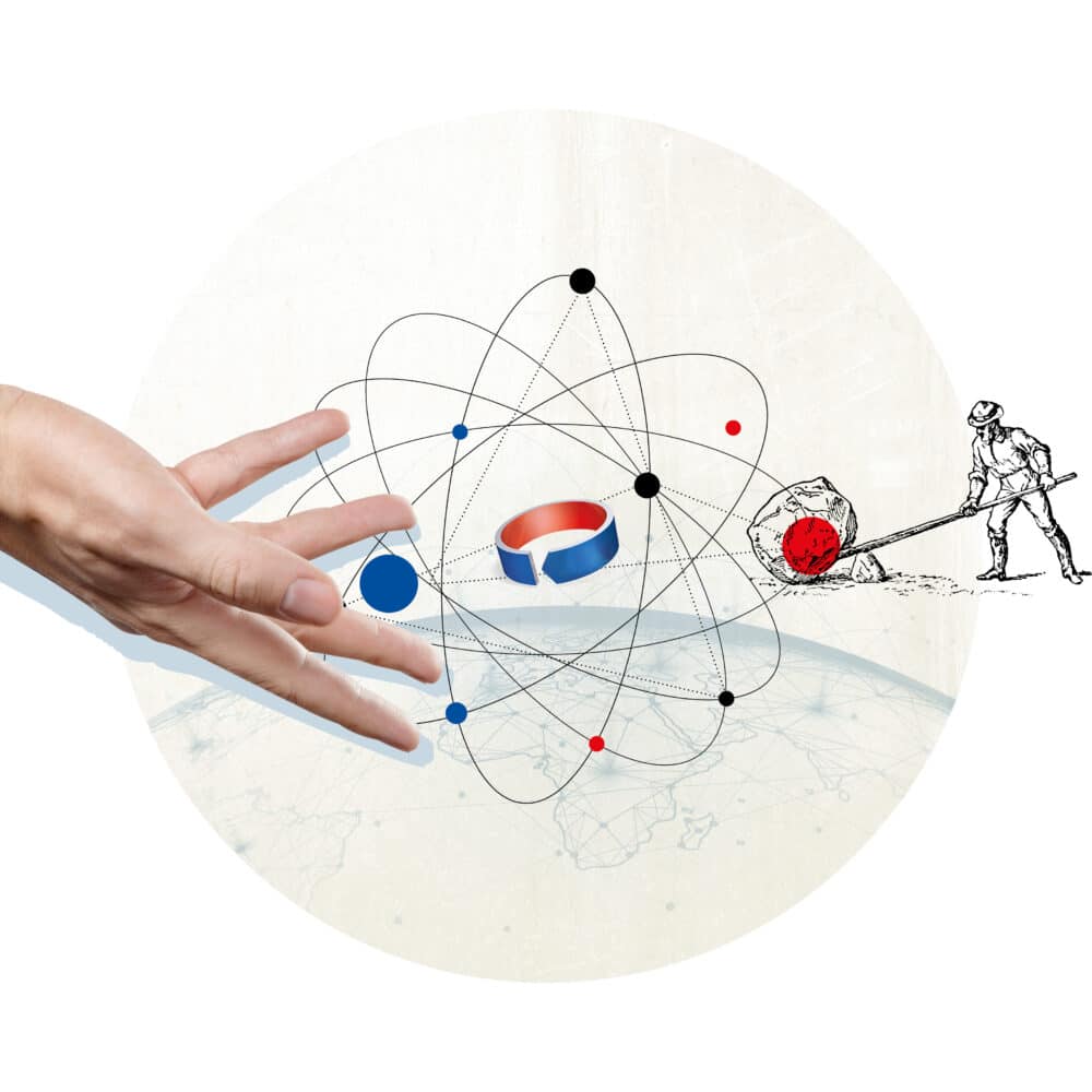 Hand, die den Knill Gruppe Ring hält, Weltkugel im Hintergrund