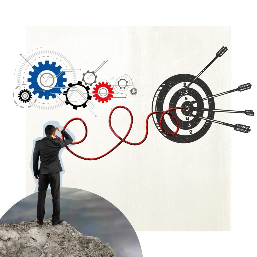 Eine Zielscheibe, ein Mann der in die Ferne blickt und Zahnräder